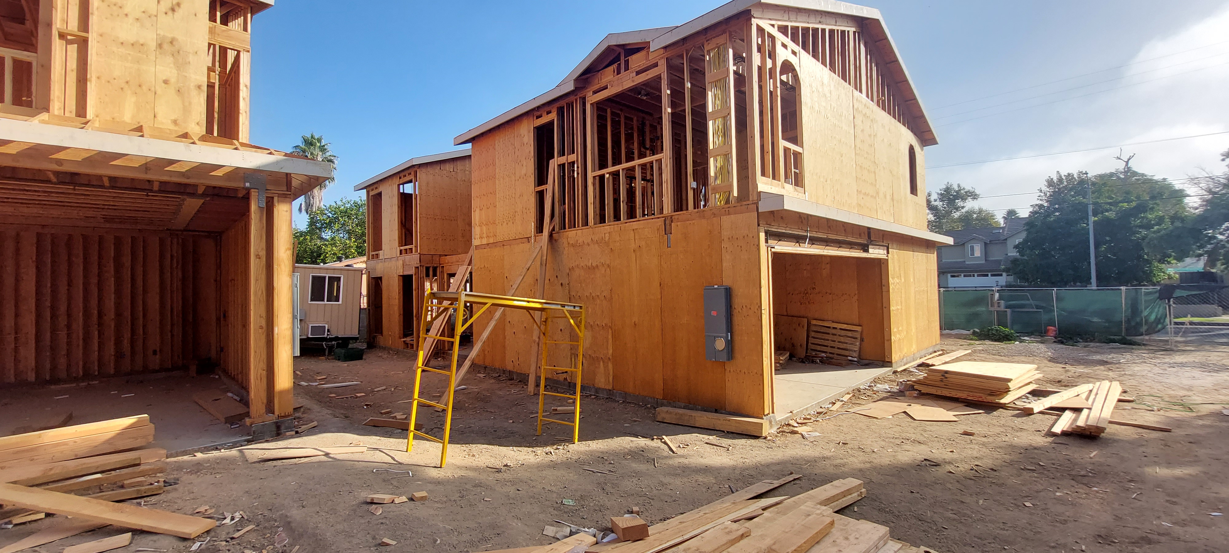 Two-story residential wood framing viewed from the exterior
